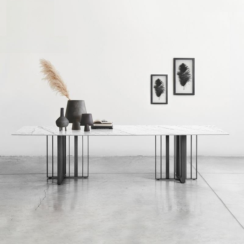 Premium dining table made of Italian laminate stone, specially designed for modern square style villas.