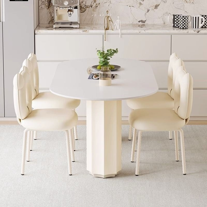 Cream Style Dining Table with Stone Top and Compact Elegant Chairs for Home Kitchen.